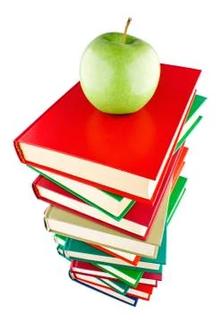 Stack of books with green apple on top Stock Photos