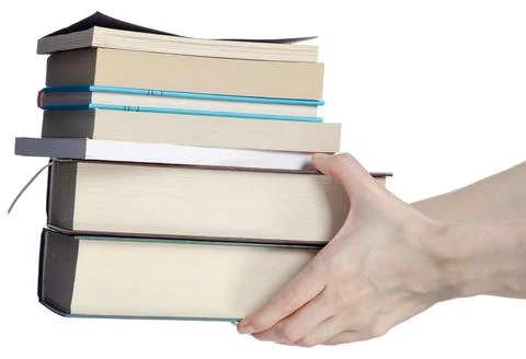 Stack of books in hand Stock Photos