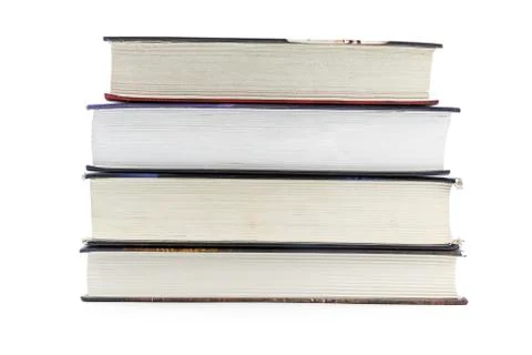 A stack of books lying on a white background Stock Photos