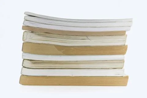A stack of books lying on a white background Stock Photos