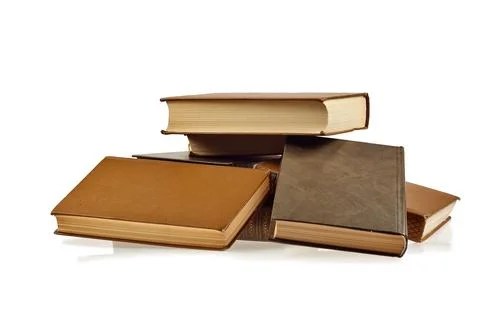 Stack of Books with One Standing Cover Facing Forward Isolated on White Stock Photos