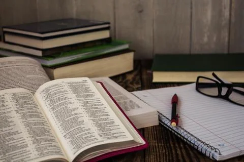 Stack of books, pecil, notebook, glasses, study Stock Photos