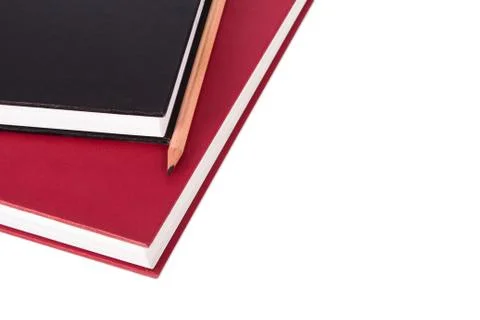 Stack of books with pencil Stock Photos