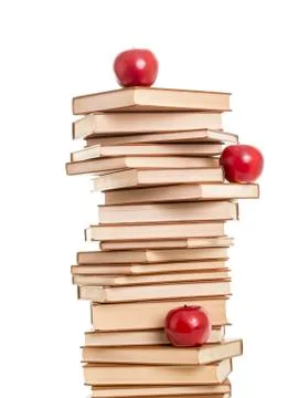 Stack of books with red apples Stock Photos