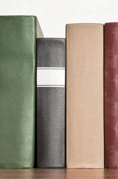 Stack of books on the shelf Stock Photos
