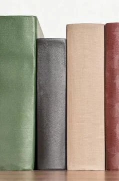 Stack of books on the shelf Stock Photos