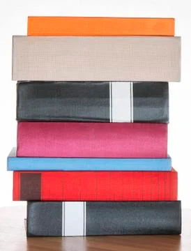 Stack of books on the shelf Stock Photos