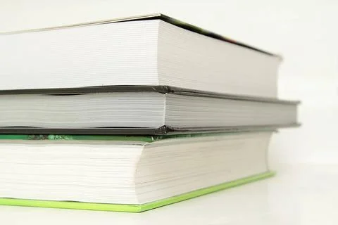 A stack of books A stack of three books, closeup photo Copyright: xZoonar.... Stock Photos