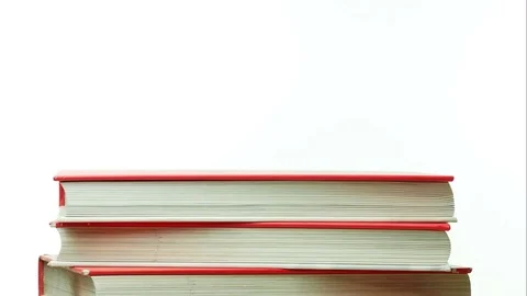 Stack of books stop motion isolated on white Stock Footage 76688628