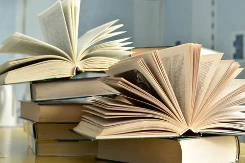 A stack of books on the table. Fotos Stock