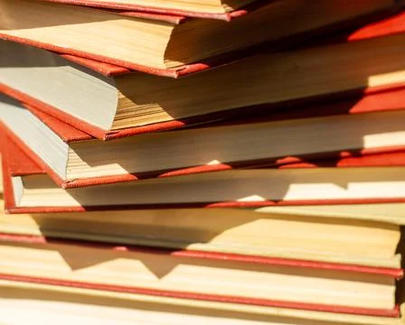 Stack of books on the table, pile of books, book background Stock Photos