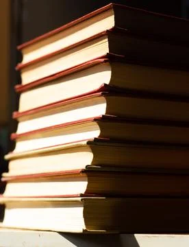 Stack of books on the table, pile of books, book background Stock Photos