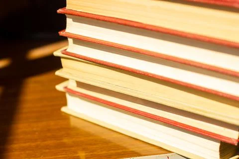 Stack of books on the table, pile of books, book background Stock Photos
