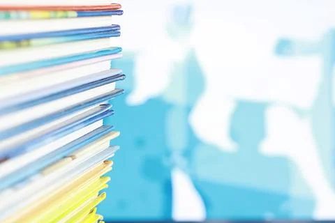A stack of books. Textbooks on the table. Tutorials are on the desk. Stock Photos