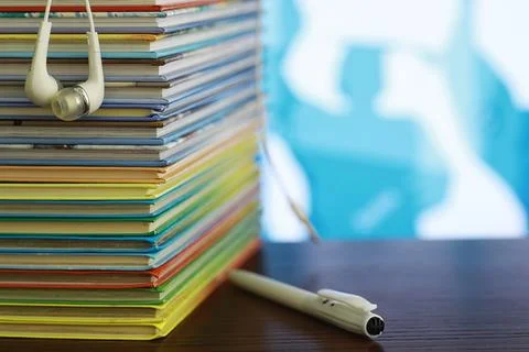 A stack of books. Textbooks on the table. Tutorials are on the desk. Stock Photos