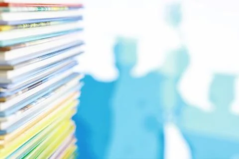 A stack of books. Textbooks on the table. Tutorials are on the desk. Stock Photos