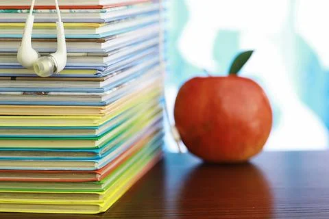 A stack of books. Textbooks on the table. Tutorials are on the desk. Stock Photos