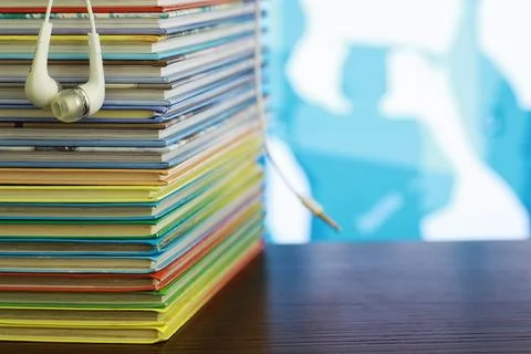 A stack of books. Textbooks on the table. Tutorials are on the desk. Stock Photos