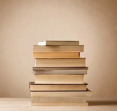 A stack of books with vintage background 写真素材