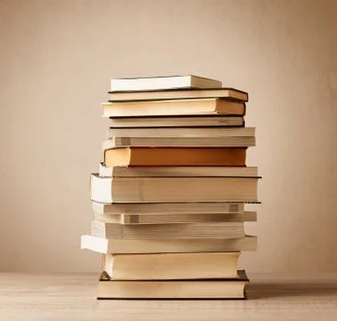 A stack of books with vintage background 写真素材