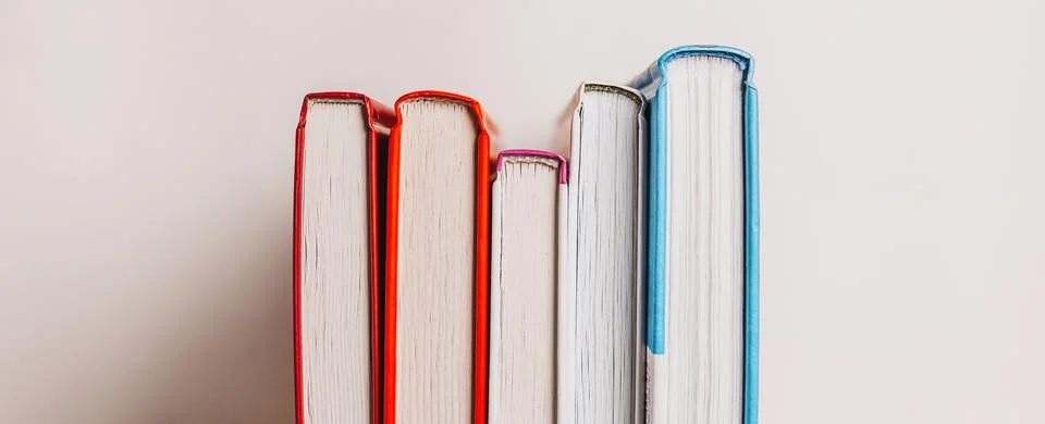 A stack of books on white background. Mock up with education and reading conc Stock Photos