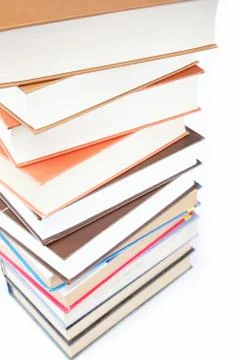 A stack of books on a white background. Stock Photos