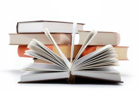A stack of books on a white background. Stock Photos