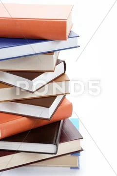 A stack of books on a white background. Stock Photos