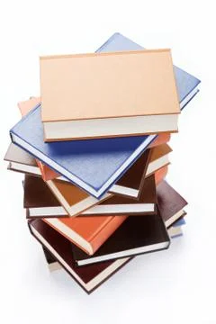 A stack of books on a white background. Stock Photos