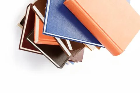 A stack of books on a white background. Stock Photos