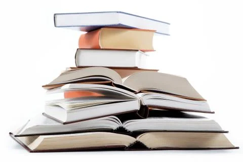 A stack of books on a white background. Stock Photos