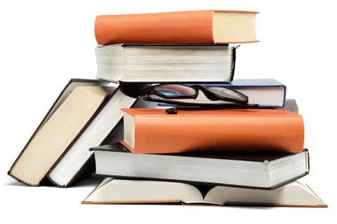 A stack of books on a white background. Stock Photos