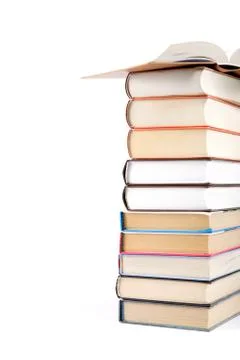 A stack of books on a white background. Stock Photos
