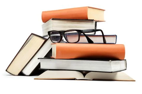 A stack of books on a white background. Stock Photos