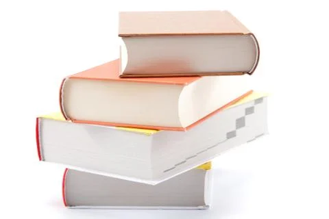 A stack of books on a white background. Stock Photos