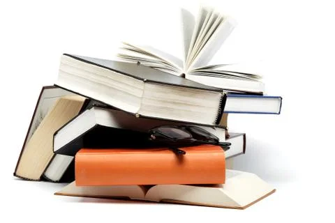 A stack of books on a white background. Stock Photos