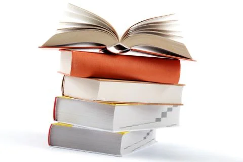 A stack of books on a white background. Stock Photos