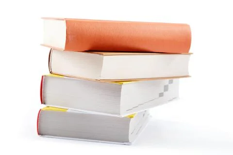 A stack of books on a white background. Stock Photos