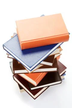 A stack of books on a white background. Stock Photos