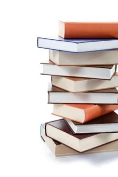 A stack of books on a white background. Stock Photos