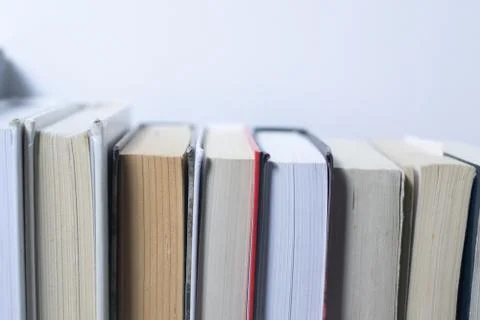 Stack of books on white background Stock Photos