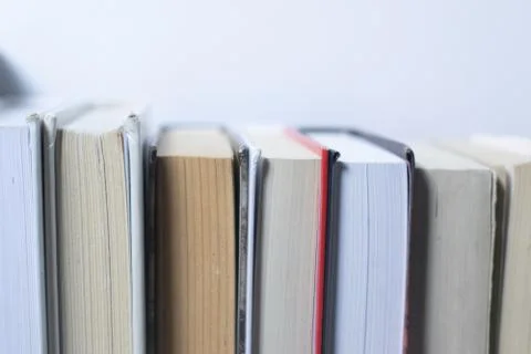 Stack of books on white background Stock Photos