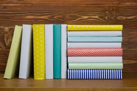 Stack of books on wooden table. Back to school. Copy space 库存照片