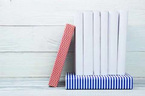 Stack of books on wooden table. Back to school. Copy space Stock Photos