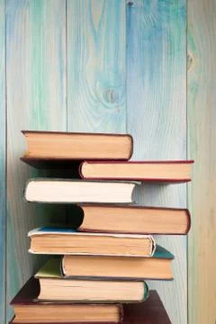 Stack of books on wooden table. Back to school. Copy space Stock Photos