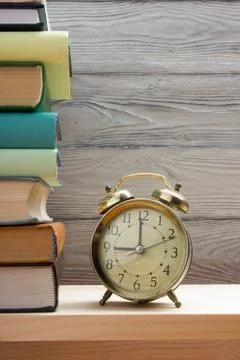 Stack of books on wooden table. Back to school. Copy space Stock Photos