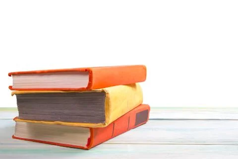 Stack of books on wooden table. Back to school. Copy space 库存照片