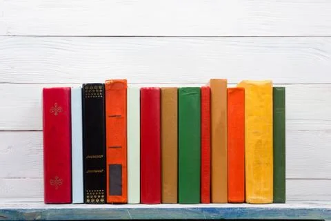 Stack of books on wooden table. Back to school. Copy space Stock Photos