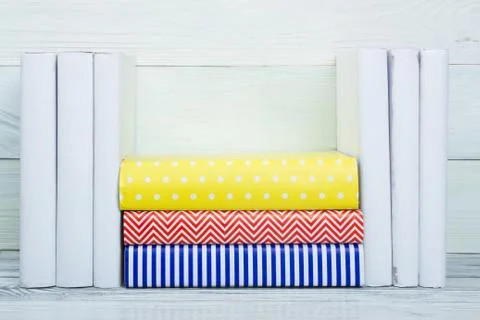 Stack of books on wooden table. Back to school. Copy space Stock Photos