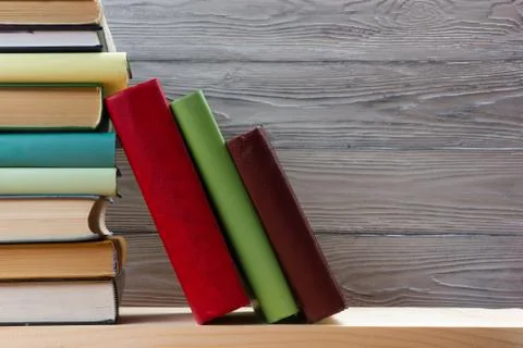 Stack of books on wooden table. Back to school. Copy space 库存照片